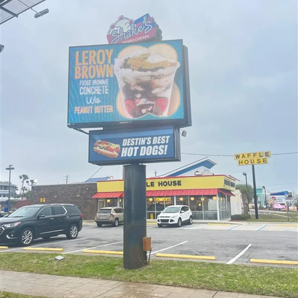 Watchfire LED sign advertising frozen custard outside Shake’s next to Waffle House in Destin, Florida.