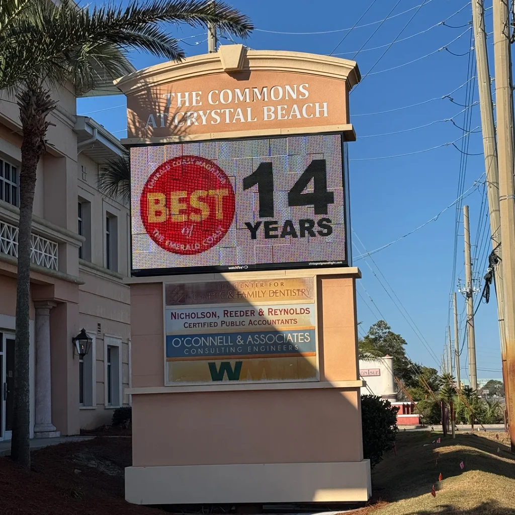 Watchfire digital sign announcing “Best of the Emerald Coast – 14 Years” at The Commons at Crystal Beach, installed by Vintage Sign & Light.