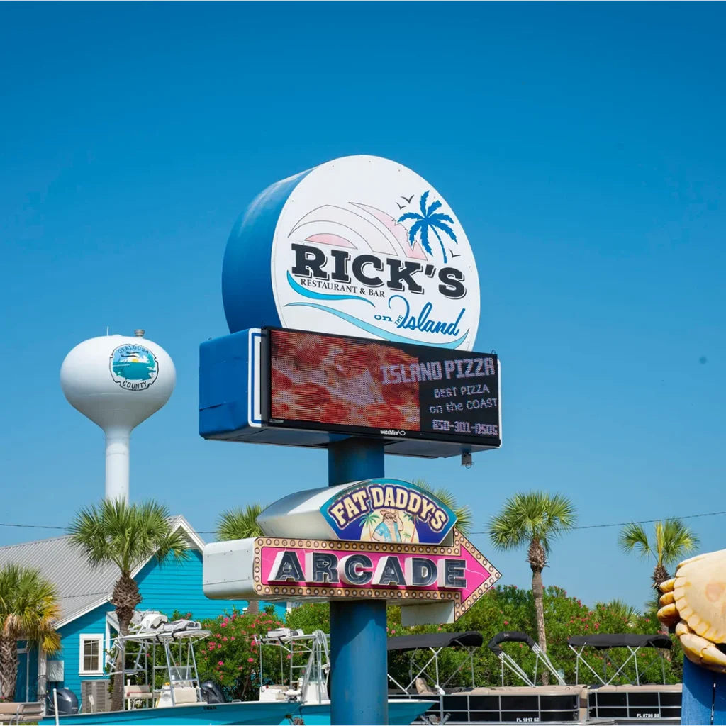 Custom electronic sign setup with branded panels designed and installed by Vintage Sign & Light
