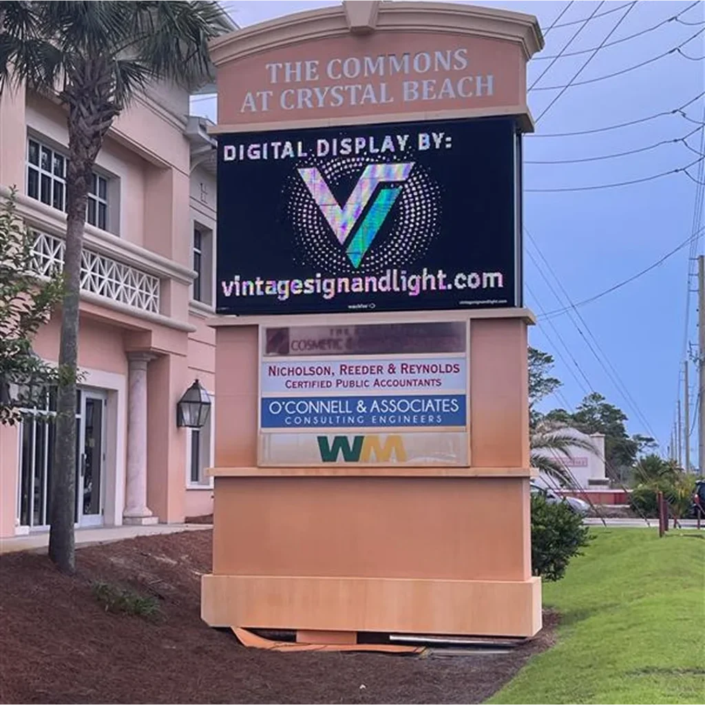 Commercial monument sign with Watchfire digital display installed by Vintage Sign & Light at The Commons at Crystal Beach.