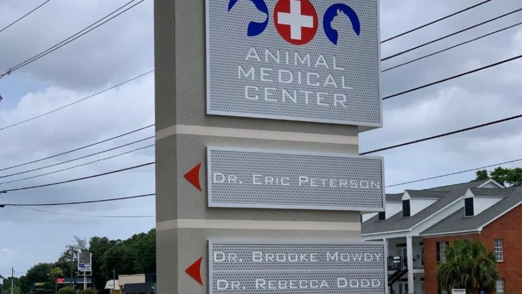 Multi tenant monument signs Plant City FL featuring Animal Medical Center with doctor names listed on panels.