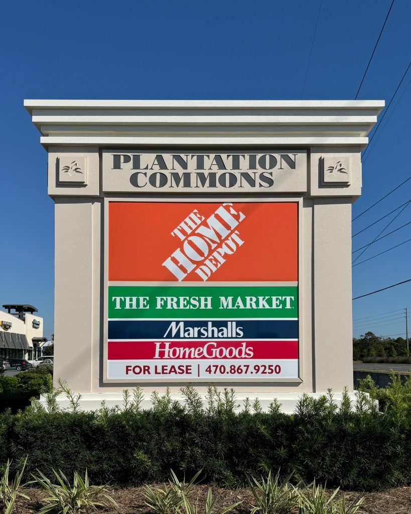 Multi-tenant monument sign design showcasing national retailers like The Home Depot, The Fresh Market, Marshalls, and HomeGoods at Plantation Commons.