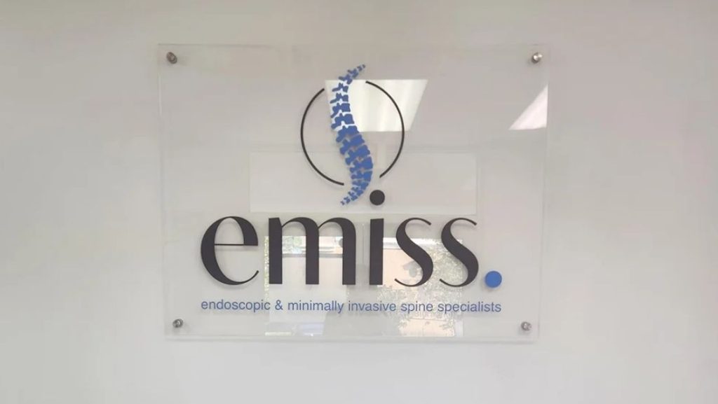 interior sign made on an acrylic that says "emiss"