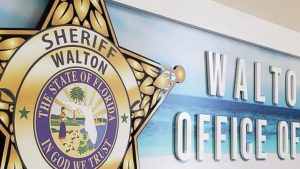 Sign for the Walton County Sheriff’s Office featuring the State of Florida seal and badge emblem.