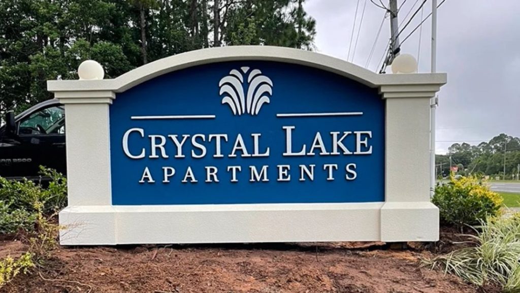 Custom monument signs for Crystal Lake Apartments with durable outdoor design and clear property branding
