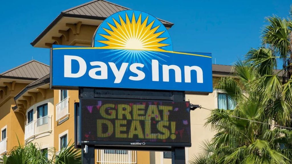 Days Inn roadside sign with a digital display advertising deals outside the hotel.