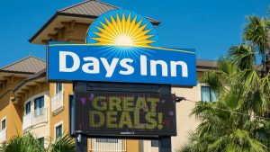 Days Inn roadside sign with a digital display advertising deals outside the hotel.