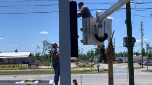 Sign technicians using a bucket truck to service an elevated commercial sign. A couple of these are especially strong for the article: drive-thru-sign-lighting-problem.jpg is probably your best visual for the Common LED Sign Problems / Uneven or Reduced Brightness area because the visible dark sections directly support what the reader is learning. led-sign-cabinet-components.jpg is excellent for Power Supply and Electrical Issues because it shows the actual internal components without needing a generic stock electrical image. professional-commercial-sign-service.jpg fits perfectly under When Should You Schedule Professional LED Sign Service? And I’d use channel-letters-and-digital-display-signs.jpg under Channel Letters and Digital Displays Have Different Maintenance Needs, because it visually reinforces the exact comparison being made in that section. For the filenames, I would not add vintage-sign-and-light to every single one. That would make them unnecessarily long and repetitive. Describing what is actually in each image is cleaner for both organization and image SEO.